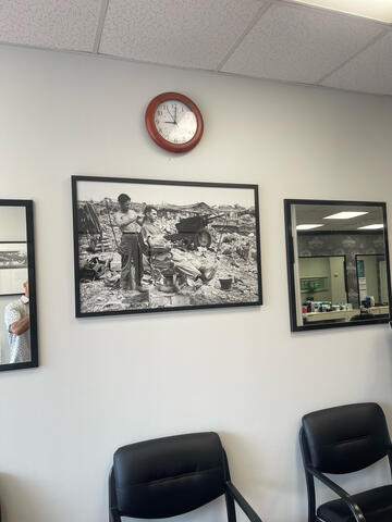 Photos hanging in the shop